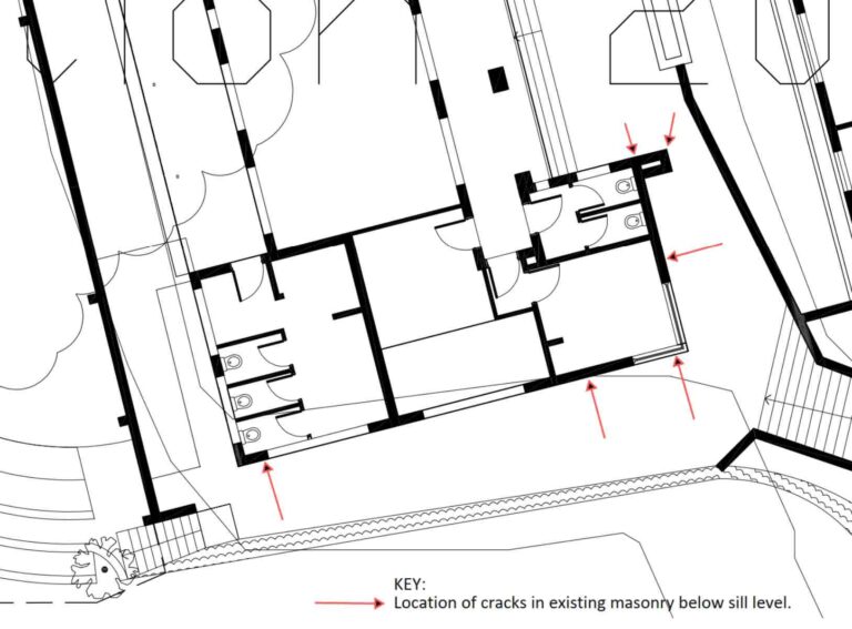 Conditional assessment report excerpt showing a part plan and the specific location of concerning wall cracks